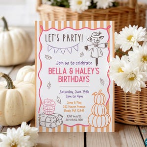 May include: A rectangular birthday invitation card with orange and white vertical stripes, featuring a scarecrow, pumpkins, and a basket of apples. The text reads: LET'S PARTY! Join us to celebrate BELLA & HALEY'S BIRTHDAYS, Saturday, June 25th, 2pm to 4pm, Jump & Play, 262 Haven Avenue, Beale, MA 12345, RSVP by 6/22, Jil 123.456.7890.
