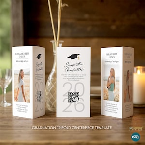 May include: Graduation trifold centerpiece template with photos, names, and school details. Features a black graduation cap graphic and the text "Snap the Graduates" with a QR code for sharing photos. The year "2020" is also displayed.