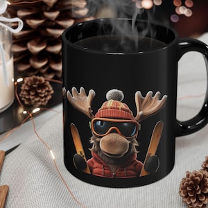 Skiing Moose Black Ceramic 11oz 15oz Coffee Mug For Winter Sports Seasons Greetings Cozy Mug For Snow Ski Lover Gift For Hot Chocolate Mug