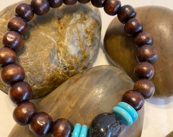 Natural Wood with a focal bead .. Beaded Bracelet