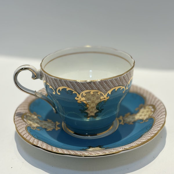 Aynsley Fine Bone China, Robins Egg Blue Teacup and Saucer with Gold Filigree Design