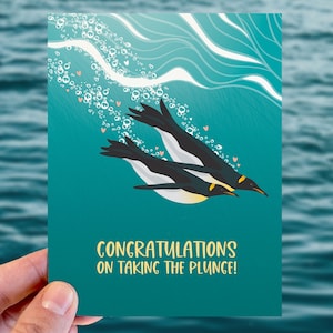 cute wedding card / penguins taking the plunge
