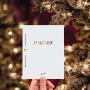 May include: A white card with the text "A2 CARD SIZE" and measurements of 5.5 inches by 4.25 inches.