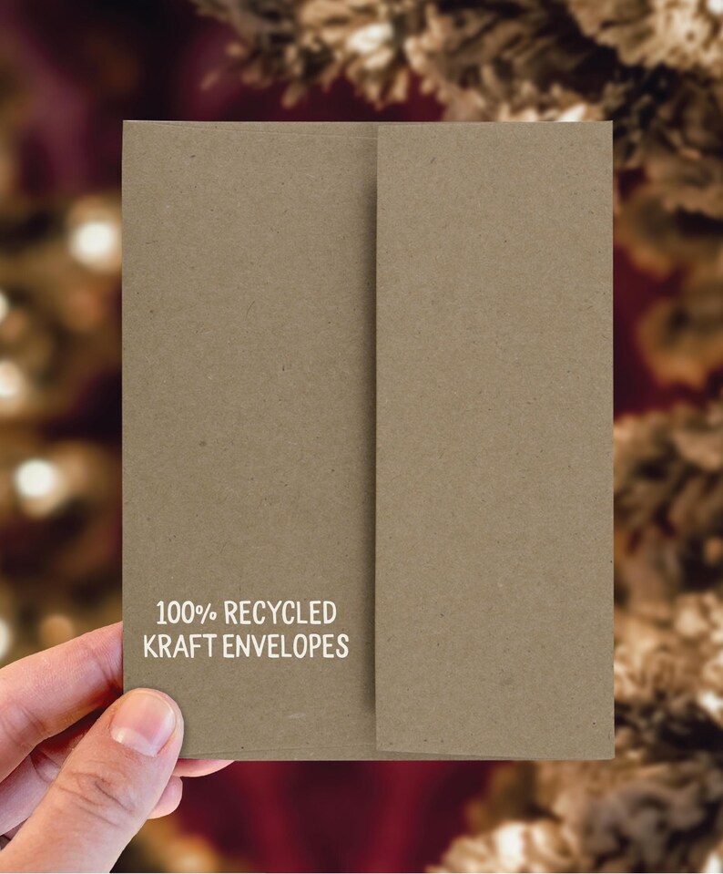May include: A brown kraft envelope with the text "100% Recycled Kraft Envelopes" printed on the front.