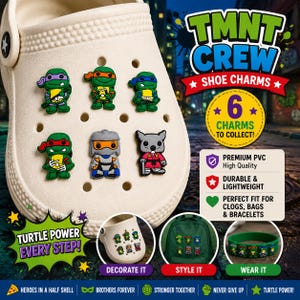 May include: A set of six Teenage Mutant Ninja Turtles shoe charms featuring characters in green, orange, blue, red, and grey. The PVC charms are designed for clogs, bags, and bracelets. The text reads TMNT CREW SHOE CHARMS, 6 CHARMS TO COLLECT, and TURTLE POWER EVERY STEP.