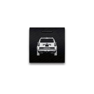 May include: A black square emblem featuring a white line art illustration of the rear view of a Toyota 4Runner SUV. The background is a repeating pattern of the text CHX4 INDUSTRIES. The vehicle graphic includes the Toyota logo and 4RUNNER text.