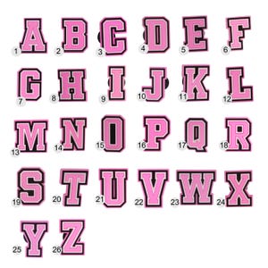 May include: A collection of 26 pink and black letter charms, each with a unique design. The letters are arranged in alphabetical order, from A to Z. These charms are ideal for personalization and crafting projects.