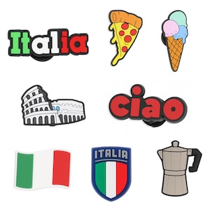 May include: A collection of Italian-themed charms, including the word "Italia" in green and red, a pizza slice, an ice cream cone, the Colosseum, the word "ciao", the Italian flag, an Italian shield, and a coffee maker.