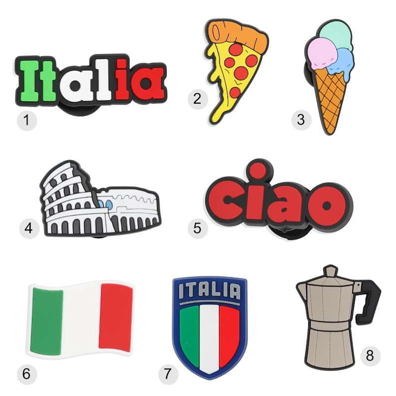 May include: A collection of Italian-themed charms, including the word "Italia" in green and red, a pizza slice, an ice cream cone, the Colosseum, the word "ciao", the Italian flag, a shield with "Italia", and a coffee maker.