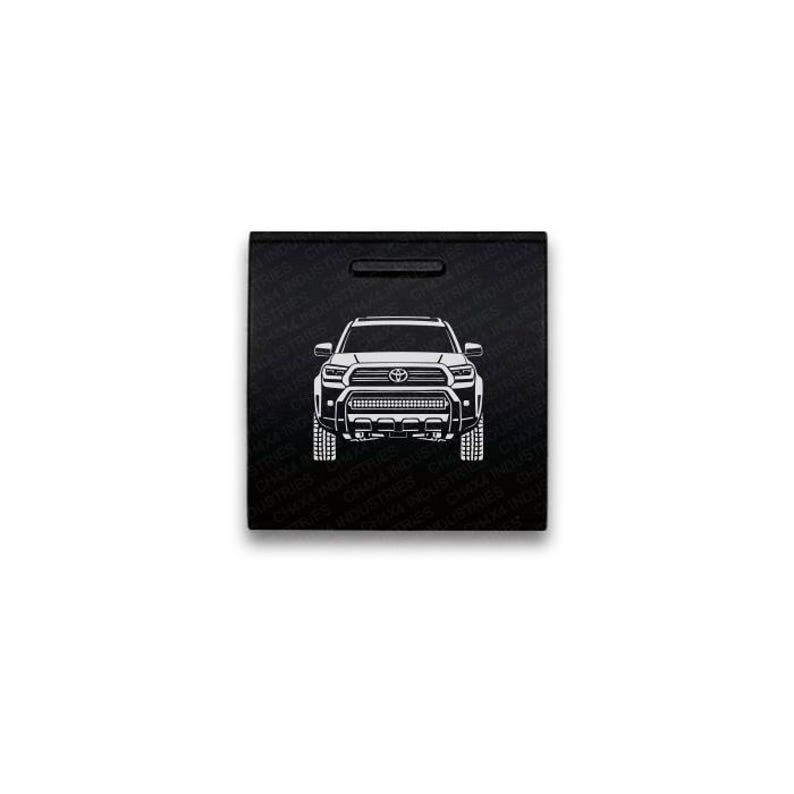 May include: A square black sign featuring a white line art illustration of a Toyota Tacoma truck front view centered on the surface. The background is patterned with repeating text that reads CH4X4 INDUSTRIES in a subtle dark grey font.