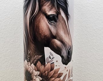 May include: A brown and white horse head with a floral design on a white background. The horse is looking to the side and has a black mane. The flowers are in shades of brown and white.