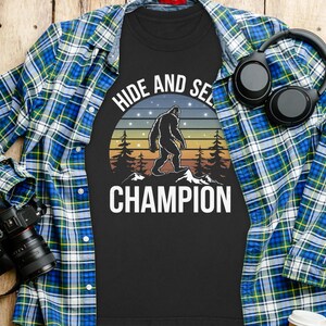 Retro Bigfoot Hide And Seek Champion T Shirt, Funny Sasquatch Graphic Tee, Bigfoot Lover Gift, Vintage Inspired Design Shirt