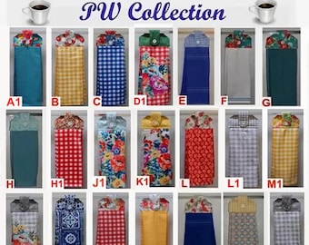 May include: A collection of twenty-one hanging kitchen towels labeled A1 through S1, each featuring a fabric topper with a button closure. The towels display various patterns including solid colors, gingham checks, and floral prints in diverse hues.