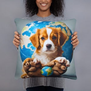 May include: A brown and white puppy holding a blue and green globe in its paws. The puppy is sitting on a blue and green globe with continents outlined in brown. The globe is surrounded by a light blue background.