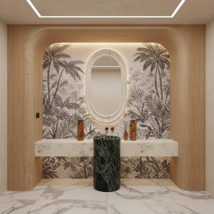 Puede incluir: Diseño de baño moderno con encimera de mármol y lavabo cilíndrico verde oscuro. La pared detrás del lavabo tiene un papel pintado tropical con palmeras. Un espejo ovalado está centrado encima del lavabo.