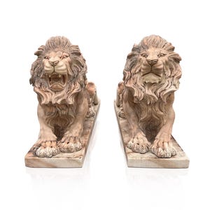 Estatuas grandes de leones de mármol rojo atardecer a la venta