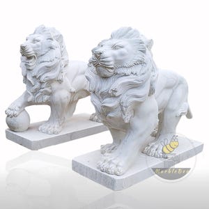 Escultura de león de mármol blanco