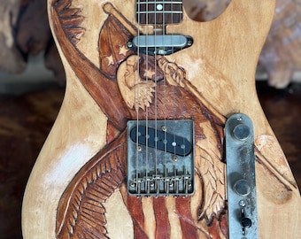 Hand carved electric guitar. Telecaster style.