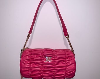 Sac tonneau rose Flash Run The World de Juicy Couture