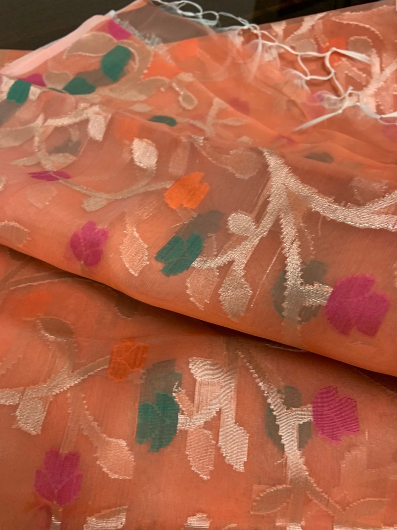Light Orange Smocking Muslin Saree with Pink Border main image 1