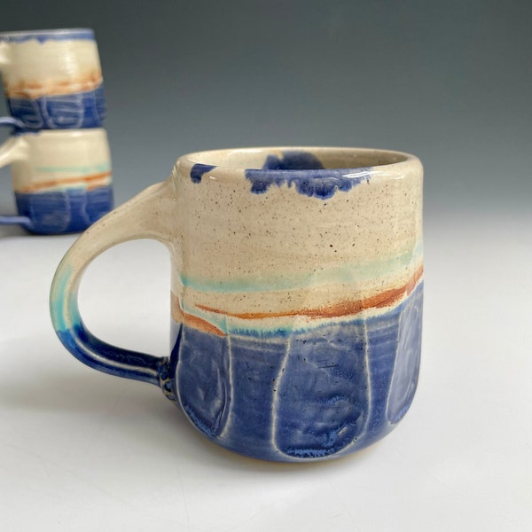 Carved Pottery Mug in White and Blues - Handmade Tea Mug - 10 Ounce Coffee Mug - Wheel Thrown Ceramics by Cherie Giampietro