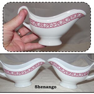 May include: Two white gravy boats with a pink floral design. The boats are sitting on a white surface. The text "Shenango" is printed below the boats.