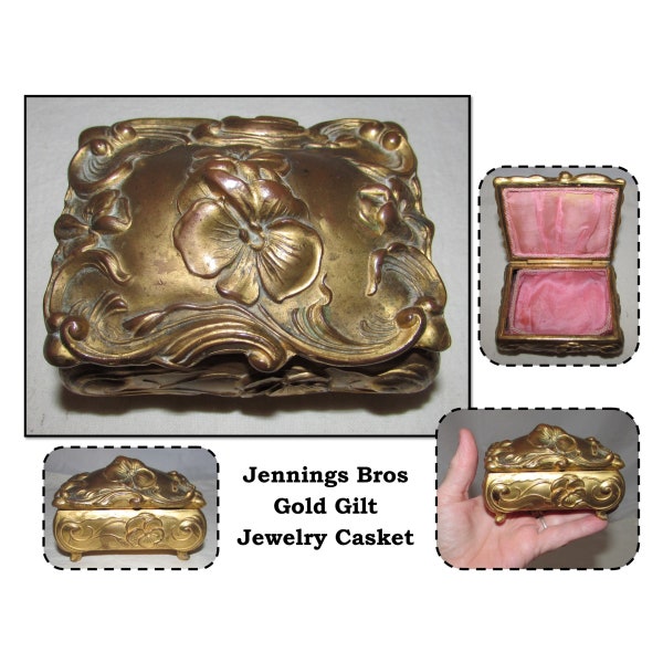 Small Antique Art Nouveau Gilt Gold Metal Jewelry Box Casket with Raised Pansies & Pink Lining by J.B., Jennings Bros, 262