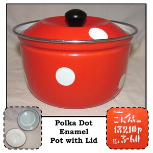 May include: Red enamel pot with white polka dots and a black lid. The pot has a silver rim and the lid has a black knob. The text "Polka Dot Enamel Pot with Lid" is printed below the pot. The text "三八〇 1572110P 23.5-600" is printed on the lid.