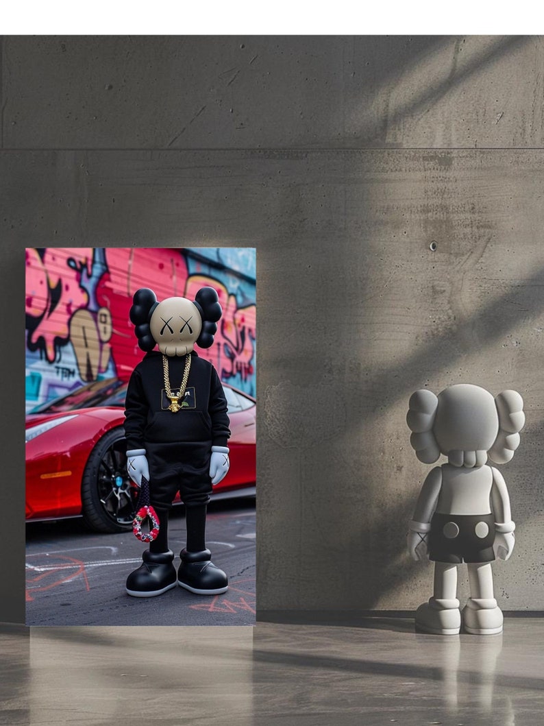 May include: A black and white toy figure with a skull-like head and a gold chain necklace stands in front of a red sports car with graffiti in the background. The figure is wearing a black hoodie and black pants.