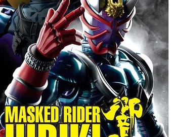 May include: A DVD box set for the Japanese television series Masked Rider Hibiki. The cover features a silver and blue masked rider with a red hand raised in the air. The title "Masked Rider Hibiki" is in yellow text and the subtitle "Vol. 1-48 End + The Movie" is in white text. The DVD box set is labeled "Original DVD9".