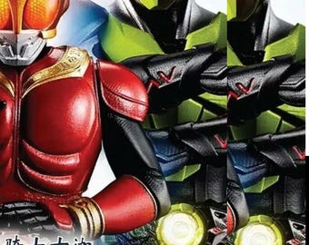 May include: A DVD cover featuring two characters from the Japanese television series Kamen Rider Kuuga. The character on the left is Kamen Rider Kuuga in his red and gold armor. The character on the right is the monster,  Grongi, in his green and black armor. The DVD cover is titled "Kamen Rider Kuuga" and "Juga" with the text "Vol. 1-49 End".