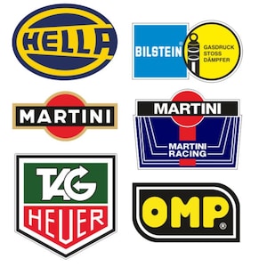 Op de afbeelding: Collectie autologo's, waaronder Hella, Bilstein, Martini, TAG Heuer en OMP. De logo's hebben verschillende kleuren en ontwerpen, met tekst- en grafische elementen. De logo's zijn waarschijnlijk voor stickers of decals.