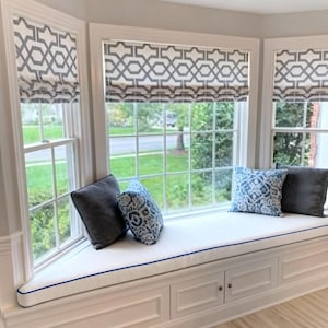 Trapezoidal Ivory Bay Window Cushion with Blue Piping and Zipper