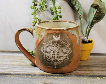 Mystic Moth - handmade ceramic mug, oranges