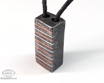 Rug pendant - iron, copper, aluminium