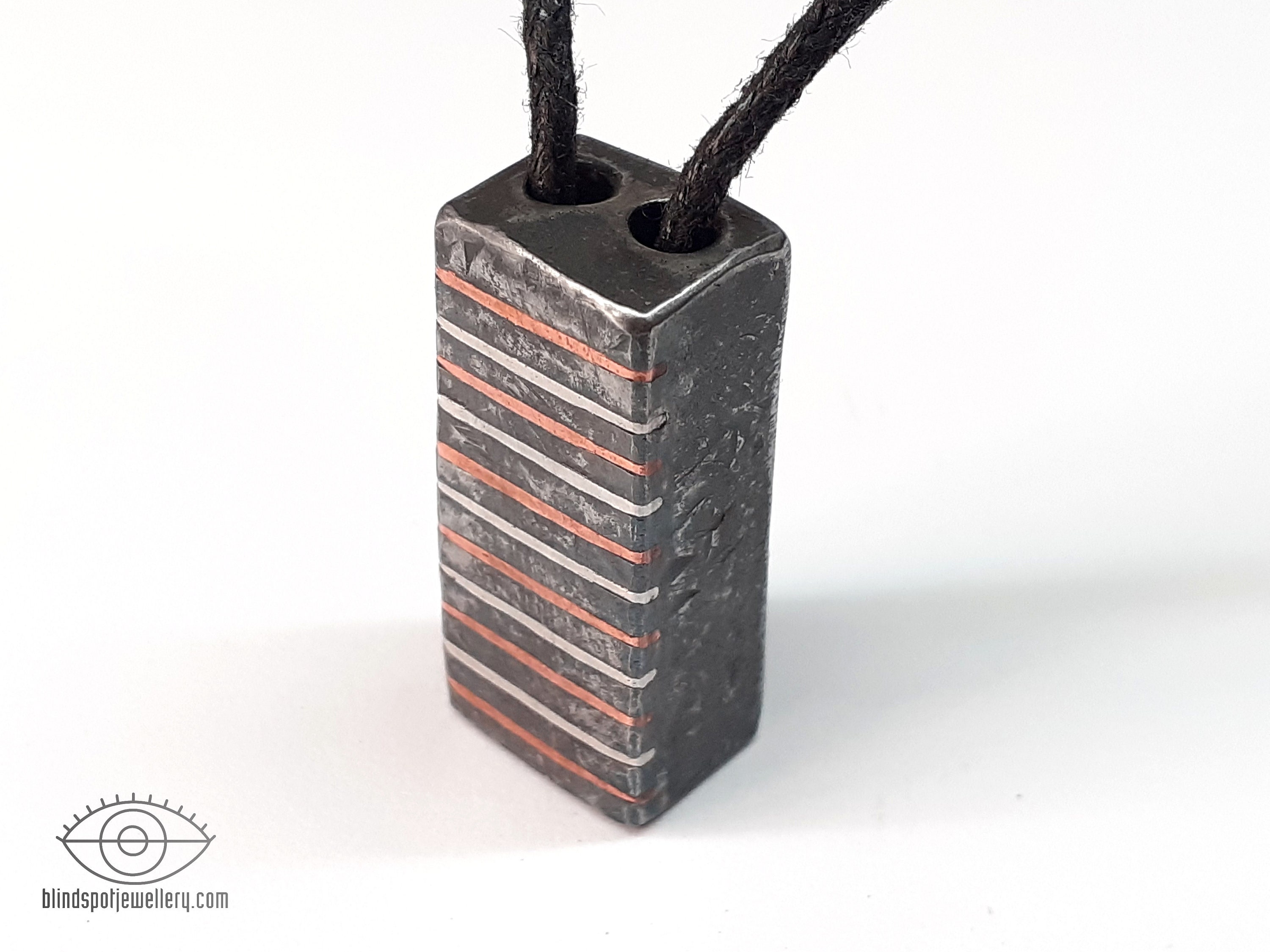 Rug pendant - iron, copper, aluminium