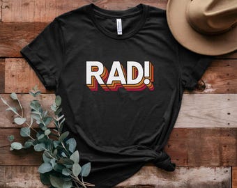 Vintage Bella Canvas T-shirt: Rolig 80-talsstil med grafisk design
