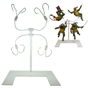 May include: A clear plastic display stand with a rectangular base and a vertical support. The stand has multiple wire arms with hooks, designed to hold action figures. Four Teenage Mutant Ninja Turtle action figures are also displayed.