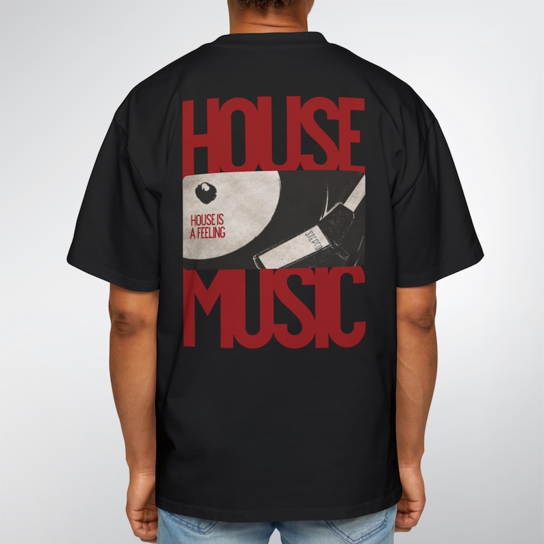 May include: Black t-shirt with a red graphic on the back that says "HOUSE MUSIC". The graphic includes a record and the words "HOUSE IS A FEELING". The shirt is a casual, oversized fit.