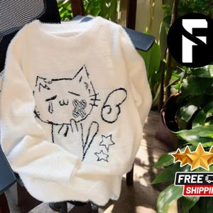 Suéter con estampado de gato de dibujos animados / Jersey de punto blanco / Cuello redondo holgado de manga larga / Prenda cómoda y liviana / Idea de regalo para ella