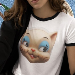 Retro Ringer Tee. Mischievous Kitten Unisex Cotton Ringer T-Shirt. Vintage Vibe Retro Kitty Cat Tee Shirt. Kitschy Cute Vibes.