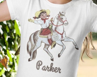 Personalized Cowgirl Retro Girl's Cap Sleeve Shirt. Western Girl with Braids Riding White Horse. Custom Gift for Toddler or Tween. Fitted.