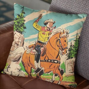May include: A vintage illustration of a cowboy riding a brown horse through a forest. The cowboy is wearing a yellow shirt, blue jeans, and a cowboy hat. The horse has a black saddle and a black bridle.