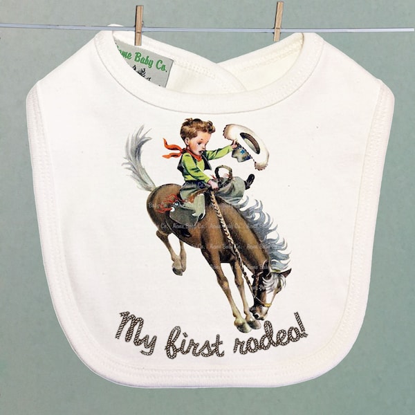 First Rodeo Retro Buckaroo Cowboy Organic Bib. Cute Western Baby Accessory that makes a unique shower gift. One size. Ships now.