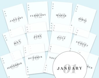 May include: A set of white vellum pages, each labelled with a month from January to December. The text "MONTHLY VELLUMS" is at the top, with "JAMISON REID DESIGNS" at the bottom. Each page has a number and month.