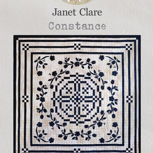 May include: A black and white quilt pattern called "Constance" by Janet Clare. The quilt measures 61 x 61 inches and features a floral design with a central square pattern.