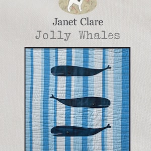 May include: A quilt pattern featuring three whales swimming in a blue and white striped ocean. The quilt measures 38 1/2 inches by 42 1/2 inches. "Quick machine piecing and raw edge appliqué" and "Janet Clare 2016" are printed on the quilt.