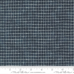May include: A dark blue fabric with a white grid pattern. The fabric has a subtle texture and a slightly faded look. The fabric is measured in inches.