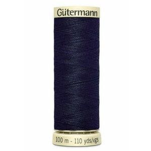 May include: A spool of dark blue Gütermann thread with the text "Gütermann" on the label. The spool is 100 metres long and contains 110 yards of thread.