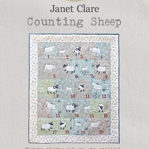 Counting Sheep - A delightful and fun appliqué quilt featuring rams, ewes and lambs frolicking in the meadow!